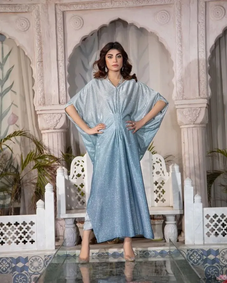 Regal Elegance: Embroidered Kaftan with Minimalist Sandals